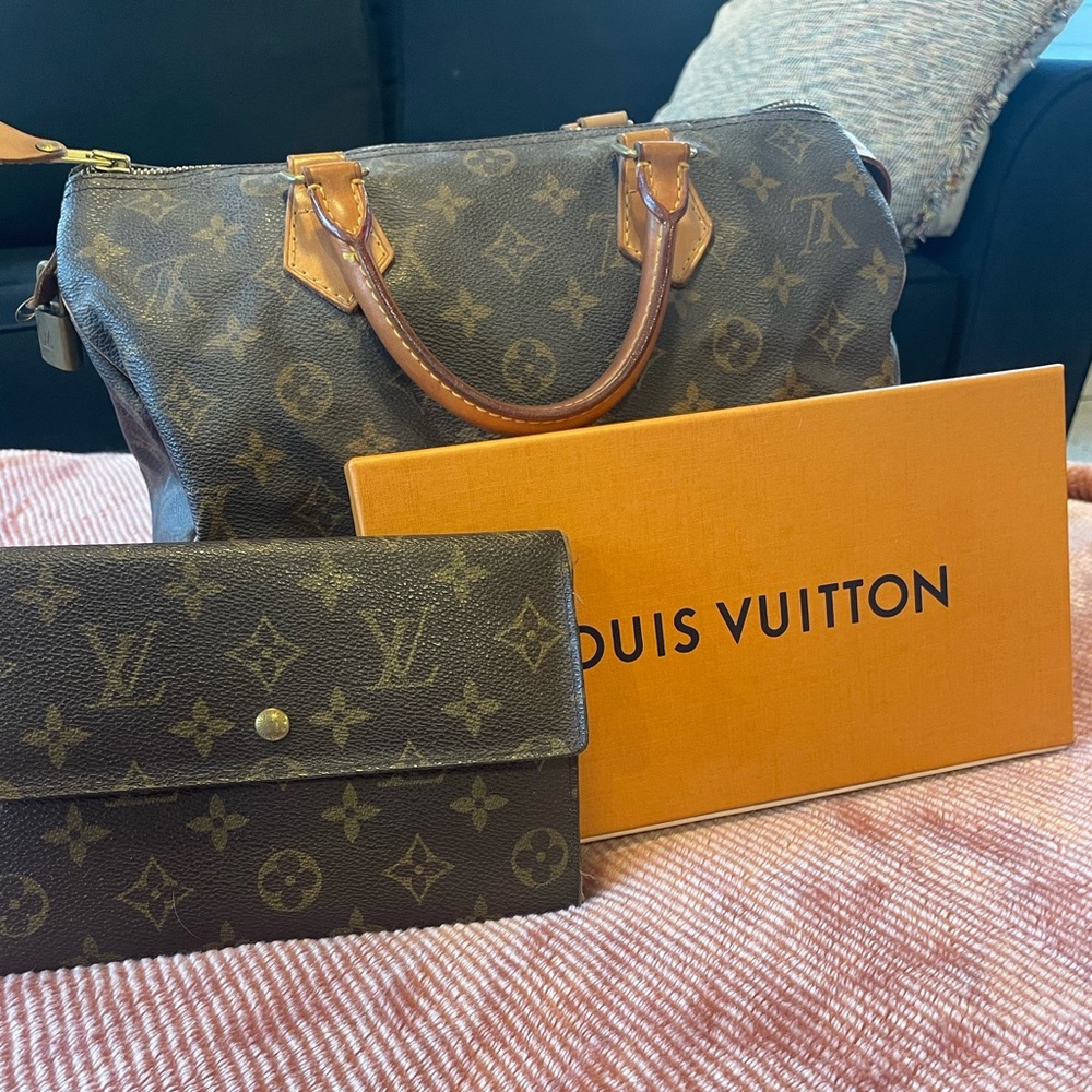 Speedy bag and trifold wallet with LV classic logo print